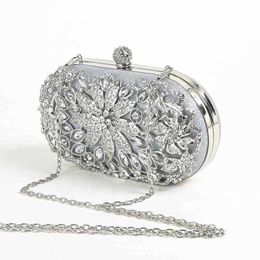 New high-end hardware diamond embellishments cheongsam bag with hollowed out inlaid diamond flower dinner bag, formal dress, party, hand-held women's bag 240222 240222