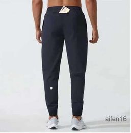Yoga pants LL Mens Jogger Long Pants Sport Outfit Quick Dry Drawstring Gym Pockets Sweatpants Trousers Casual Elastic Waist fitness lu Sports casual