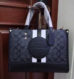 Womens Field Coch Pochette Designer Bag 10A Sacoche Dempsey Shop the Tote Bag Luxurys Handbag Canvas Shoulder Bag Mens Denim Stripe Leather Clutch Crossbody B 658