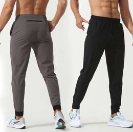 LU Womens LL Mens Jogger Long Pants Sport Yoga Outfit Quick Dry Drawstring Gym Pockets Sweatpants Trousers Casual Elastic Waist Fitness Leggings High Quality4356