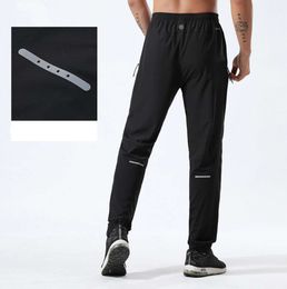 LL Men Jogger Long Pants Sport Yoga Outfit Quick Dry Gym Pockets Sweatpants Trousers Mens Casual Elastic Waist Fitness Designer Pants L0562