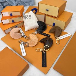 Keychains Lanyards Box Fortune Cookie Hanging Flower Charm Jewelry Women Men Gifts Fashion Pu Leather Key Chain Accessories Motion Current