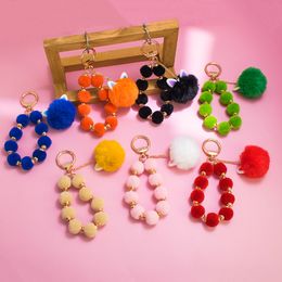 New autumn and winter Colour hair ball keychain mobile phone pendant pendant cute rabbit ears plush chopped beaded schoolbags