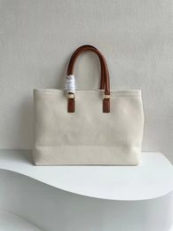 Printed canvas and calf leather handbag, fashionable laptop bag, inner zipper pocket, versatile short distance travel shopping bag Luxury Designer Bag designerbags