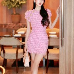 Designer Women's dress Sexy Slim Fit Wrapped Hip mini pink Dresses Spring Trendy Fashion Pink Short sleeved Plush Skirt Simple and Elegant Metal Button