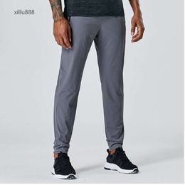 2024Yoga LL Mens Jogger Long Pants Sport Outfit Outdoor City-Sweat Yogo Gym Pockets Sweatpants Trousers Casual Elastic Waist Fitness LU Designer P545