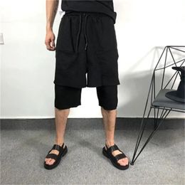Mens loose and fake two-piece shorts summer fashion large loose and asymmetrical Harlan casual shorts thin beach pants 240223
