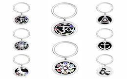 u27 Key ring Perfume Aromatherapy Essential oil Diffuser Locket Key chain Alloy 30mm Hollow Locket Key Ring with 5pads randomly9805227