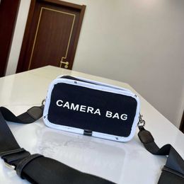 designer camera Bag Women canvas shoulder Crossbody Bags Leather Handbag Designer Triangular Flip Clutch Female Purses 2306152810