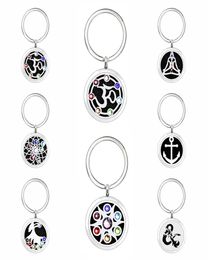 u27 Key ring Perfume Aromatherapy Essential oil Diffuser Locket Key chain Alloy 30mm Hollow Locket Key Ring with 5pads randomly4619302