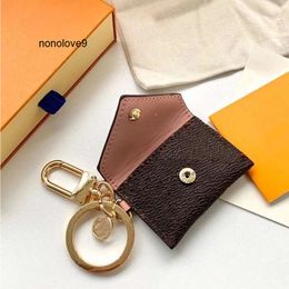 2024 New Designer Letter Wallet Keychain Keyring Fashion Purse Pendant Car Chain Charm Brown Flower Mini Bag Trinket Gifts Accessories