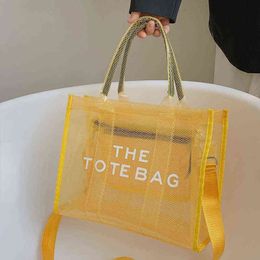 Totes the Tote Bag Women handBag Candy Colour Transparent Jelly shopping Bag Pvc Mesh Beach Handbag 2206172790