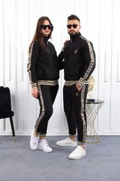 Pantaloni da donna in due pezzi Abbigliamento sportivo nero Giacca da jogging casual con zip e pantaloni sportivi firmati Set nave libera