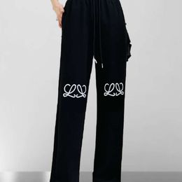 Bahar kadınlar tasarımcı pantolon kadın işlemeli grafik pantolon pamuk akımları bağcıklı sıradan pantolon