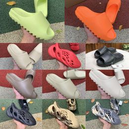 Slides Hausschuhe Freizeitschuhe Desert Sand Brown Flat Herren Damen Gummi MXT Moon Grey Mineral Blue Beach Resin Slide Sandale Graffiti Bone Vermillion Red Designer Y26