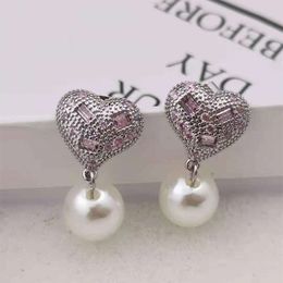 Designer miuimiui Miao Jias 21 New Pink Crystal Heart Shaped Pearl Earrings with High Grade Feeling and Temperament Geometric Pink Diamond Heart Earrings