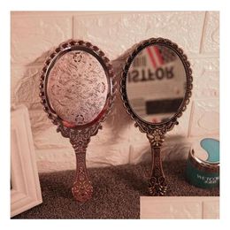 Mirrors 100Pcs Mini Portable Vintage Mirror Handhold Makeup Floral Oval Round Cosmetic Hand Held With Handle For Women Drop Delivery Dhhnk