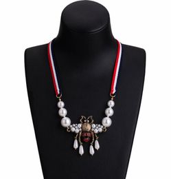 Whole Bohemian Fashion Crystal Pearl Bee Pendant Necklace Striped Ribbon Sweater Chain Women Charm Jewelry Accessories3469153