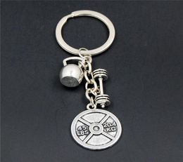 10pcBarbell Keychain Gym keep fitness Sport Kettle Bell And Strong Is Beautiful Charm body building Key Ring For Men Women6484685