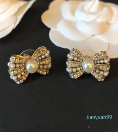 Light luxury fashion bow earrings accessories rhinestone size rice pearl earrings whole ladies wedding jewelry3092210