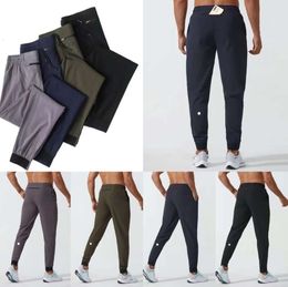 LU womens LL Mens Jogger Long Pants Sport Yoga Outfit Quick Dry Drawstring Gym Pockets Sweatpants Trousers Casual Elastic Waist fitness fallow