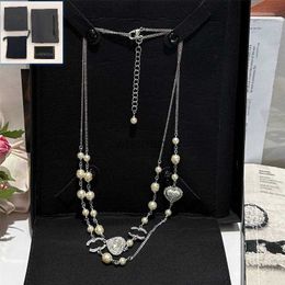 Necklaces Necklaces Women Charm Pearl New Designer Style Womens Birthday Travel Romantic Necklace with Heart Long 240228