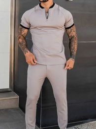 Men's Tracksuits New autumn mens casual simple T-shirt sports short sleeved+Trousseau fashion short sleeved fitness jogger Siz from the United States J240228