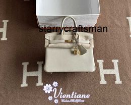 Genuine Leather Handbag l Directors Hand Bag 25cm White Powder 10 Togo Cowhide Gold Buckle