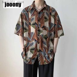 Men's Tracksuits Korean mens fully matched fashionable short sleeved loose vintage Harajuku simple beach print street clothing mens casual top Q240228