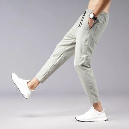 Pantaloni Pantaloni nuovo stile Pantaloni casual da uomo Autunno e inverno Piedi piccoli Moda coreana Pantaloni Wei a gambe larghe sportivi a nove punti