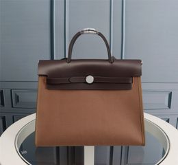 Borse di tela 31CM Design di lusso alla moda Borse da donna ad alta capacità Borse a spalla impermeabili con chiusura stampata Cowskin Borsa in vera pelle Sciarpa Fascino cavallo