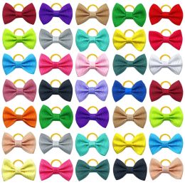 Accessories 100pcs Colorful Dog Bowknot Pet Hair Bows Decorate Solid Color Bows with Rubber Band for Small Dogs Puppy Pet Headwear