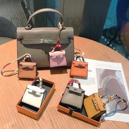 Keychains & Lanyards Designer fashion leather Mini Bag pendant lovely women Mini headset bag Key Chain Pendant MT6J