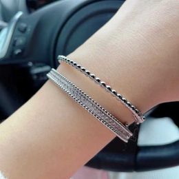 Designer Van cl-ap 925 sterling silver Fanjia rice bead bracelet plated with 18K gold round plain face exquisite high version