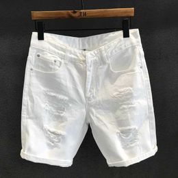 Men's Shorts Summer mens fashionable white hole washed denim shorts casual scratch beggar straight shorts J240531