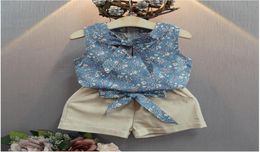 Baby Girl Summer Set Girls ärmellose Blumendruck Tops T -Shirt Khaki Short Hosen Anzüge Kinder Mode Kleidung zwei Teile C2346517