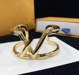 Avancerad kvinnors handguld och silverarmband öppna armband bokstavsbutik lyxarmband