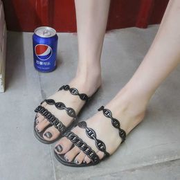 Wind pig nose chain slippers womens summer flat bottoms wear net red holiday beach one word cool slippers jelly shoes