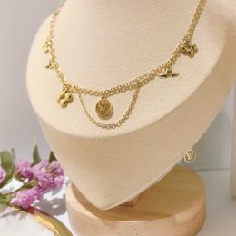 18 -karatowe złote naszyjniki ze stali nierdzewnej Choker łańcuch listu zamek w zawieszek moda damska naszyjnik ślubna biżuteria akcesoria x095