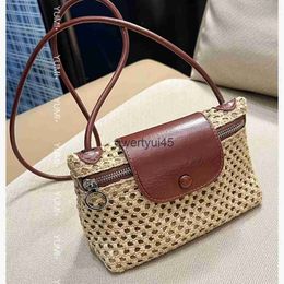Shoulder Bags Crowd design Lafite grass cowhide patchwork lunch box bag summer new woven small square versatile commuting crossbody H240603