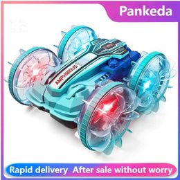 Electric/RC Car New Amphitheatre RC car cool light music 4WD 2.4G gesture sensing 360 Water stunt Double drift stunt car Childrens toys Gifts G240529