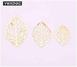 YWXINXI 50Pcs fashion simple leaf filigree metal handicraft jewelry DIY handmade jewelry pendant costume decoration5494138
