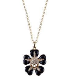 Black small flower inlaid with gold skull Saturn necklace Lacquered skull flower necklace8704445