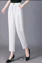 夏の新しい中年のお母さんの多目的なファッションソリッドカラースリムフィットルーズ9ポイントハーランパンツ女性用薄いカジュアルパンツ