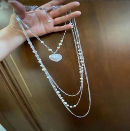 Pendant Necklaces High quality luxury jewelry High quality sweater chain twisted piece chain heart diamond pearl four layer necklace
