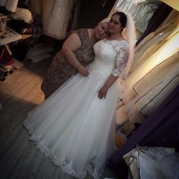 Vestidos de novi Mezzo manicotto per matrimoni più dimensioni Un abito da sposa applique in pizzo a forma di filo da sposa realizzato 0605