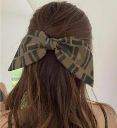 Retro kız saç klipleri tatlı yay yayı klipsler bowknot barrettes harf katmanı saç tokası lüks tasarımcı saç aksesuarları