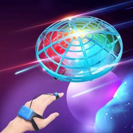 Novelty Games Mini watch RC UFO drone with light sensor four helicopters collision resistant flying ball helicopter drone childrens toy T240605
