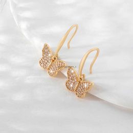 Hot selling copper inlaid zircon butterfly earrings light luxury high-end full diamond ear hook for women