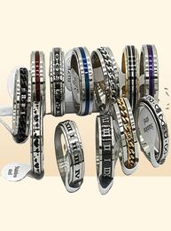 30pcslot Design Mix Spinner Ring Rotate Stainless Steel Men Fashion Spin Ring Male Female Punk Jewelry Party Gift Whole lots2795236